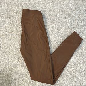 Tan/brown leather pants in ok condition